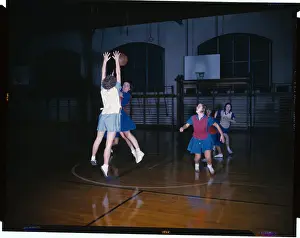 Prints of (Original Caption). Wellesley College-Basketball in gym Hoops Through Time: A Visual Journey of Basketball History: Women's Basketball at Wellesley College