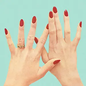 Womens Hands With Red Polish
