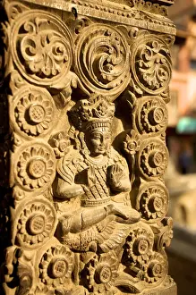 Crafts Prints: Woodcarving with god Shiva on the buttress of a house, Bhaktapur, Nepal, Asia