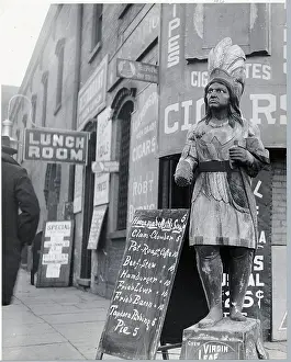 Wooden Native Am Statue In Front