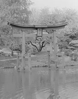 Chinese Script Prints: Wooden pagoda structure in lake