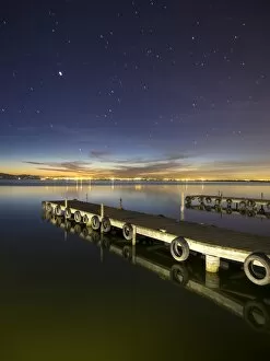 Images Dated 28th March 2015: Wooden pier on a lake in the night
