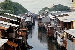 Prints of Wooden houses along a river in the Cholon neighbourhood of Saigon (later Ho Chi Minh City), Vietnam, October 28th 1969. (Photo by UPI/Bettmann Archive/Getty Images) Vietnam Prints: Wooden Shacks In Cholon, Saigon