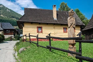 Images Dated 10th August 2015: Wooden statue at the entrance to Vlkolinec