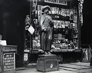 Turban Prints: Wooden Statue In Front Of Shop Window