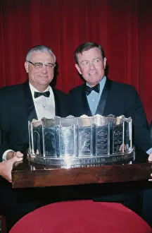 Woody Hayes and Darrell Royal Posing with MacArthur Bowl Award