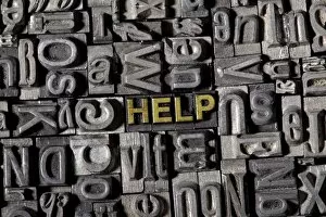 The word help, made of old lead type