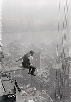 Progress Prints: Worker Building Skyscraper