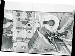 Heligoland Prints: Worker Dismantling Heligoland Weaponry Structure
