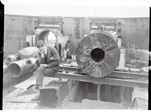 Heligoland Prints: Worker Examining a Gun at Heligoland Island
