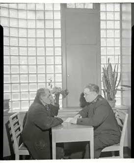 Worker Interviewing Alcoholic