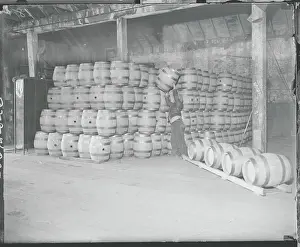 Struggle Prints: Worker Lifting Beer Barrel