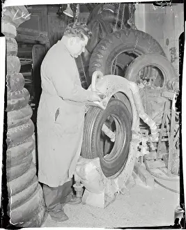 Worker Making a Tire