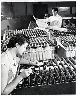 Electronic Prints: Worker Soldering Power Cable