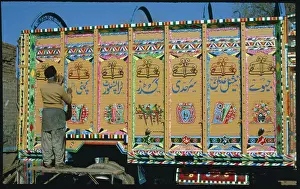 Worker Writing On Truck