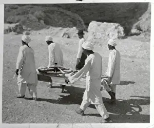 Luxor Prints: Workers Carrying Chariot Wheels on Stretcher