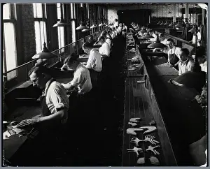 Leather Prints: Workers Cutting Leather In Show Factory