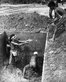 Workers Digging in Rectangular Pit