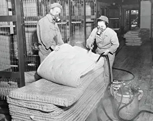 Workers Disinfecting Mattresses