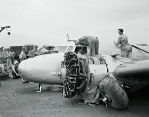 Honolulu Prints: Workers Examining Amelia Earhart's Airplane for Engine Problems