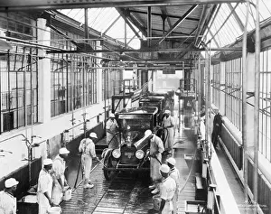 Hose Prints: Workers at First Car Wash Spraying Car