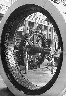 Huge Prints: Workers Framed By Round Object/Electric
