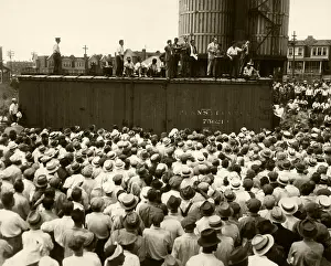 Airport Prints: Workers Listen to Man Speaking on Boxcar