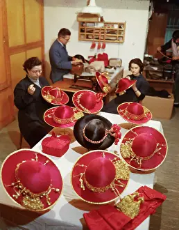 Workers Making Red Hats for Cardinals