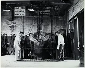 Protective Prints: Workers At Metal Works; Safety Sign