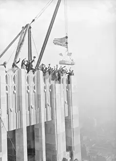 Workers Placing Last Stone on RCA Building