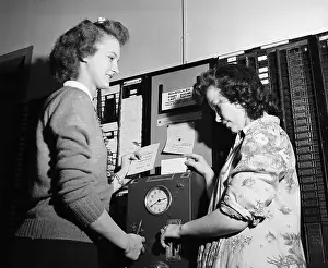 Workers Punch Time Clock