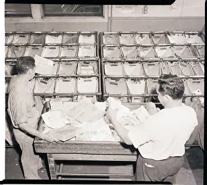 Workers Sort Letters into Airmail Bags