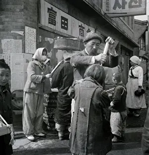 Seoul Prints: Workers Spray Ddt Over Children On Str