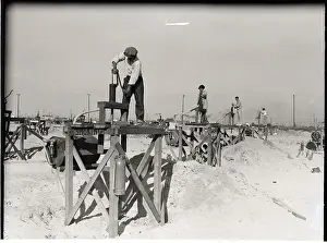 Petroleum Prints: Workers Standing On Miniature Oil Wells