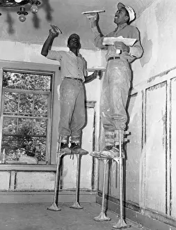 Laborer Prints: Two workers on stilts painting calling