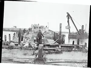 Heligoland Prints: Workers Tearing down Heligoland Harbor Site