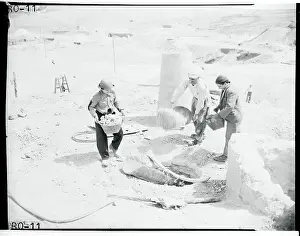 Workers Throwing Stone Into an Oven