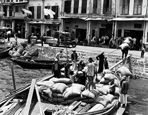 Singapore Prints: Workers Unloading Sacks of Grain