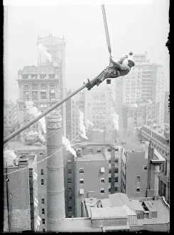 Caution Prints: Workman Hanging from Flagpole
