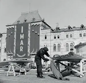 Workman Preparing for May Day