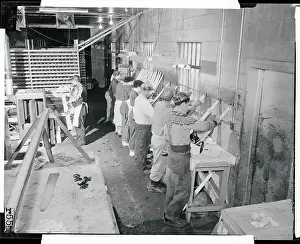 Workmen Cleaning Mink Skins