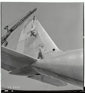 Burbank Prints: Workmen Cleaning a Transport Plane