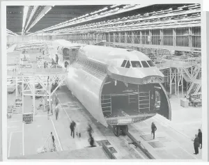 Heavy Prints: Workmen Constructing Transport Plane