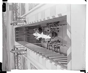 Workmen Hoisting a Nike Missile