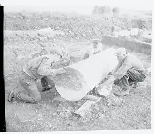 Workmen Moving a Column