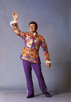 Singer Prints: World Famous Liberace Posing in Colorful Attire