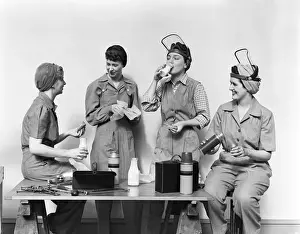 World War II (1939-1945) Prints: Four World War 2 Women Taking A Lunch Break All Wearing Coveralls & 2 Wearing Raised Face