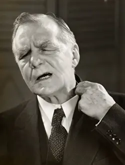 Worried executive loosens collar