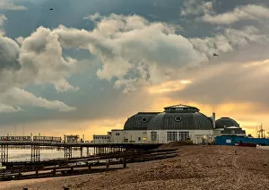Worthing, Sussex evening view, sun behind the pier