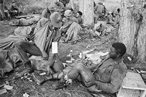 Evacuation Prints: Wounded Medic Helping Fellow Wounded Troop